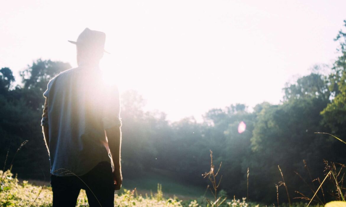 picture of a man enjoying walking in nature. Article draws comparisons with online marketing