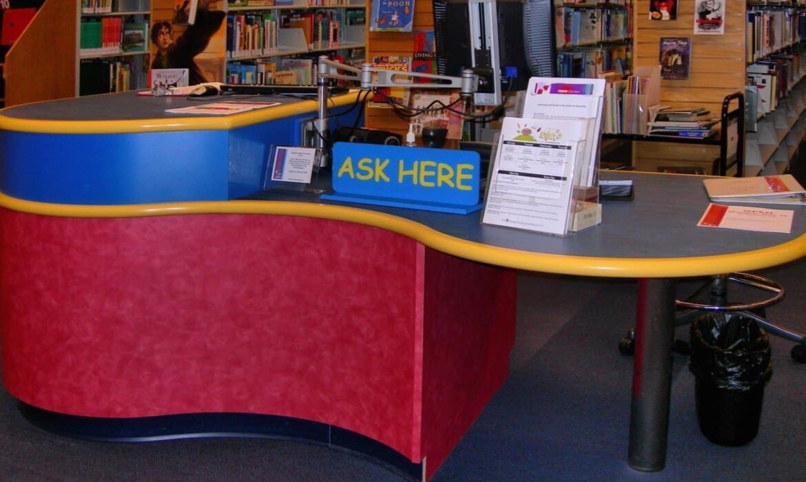 Picture of a help desk in a library.